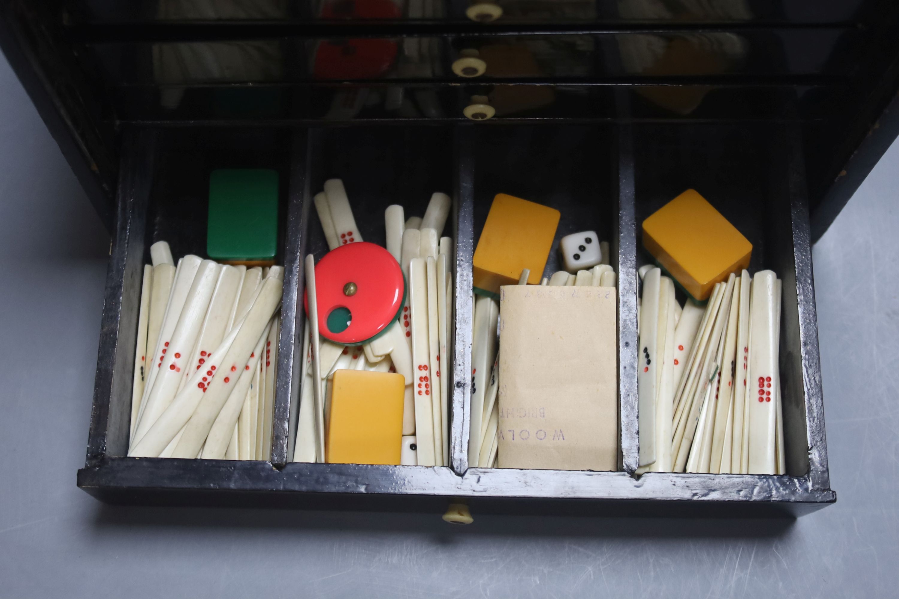 A Chinese lacquer cased Mah Jong set